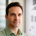 Gaedy Ban, head of engineering, reviewing a server architecture diagram